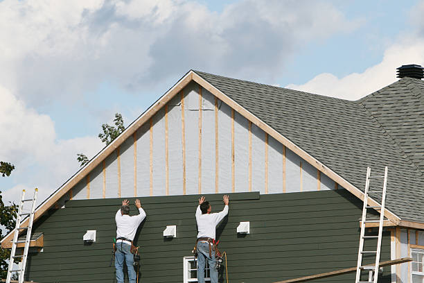 Professional Emergency Siding Repair technician working in Montgomery Village, MD
